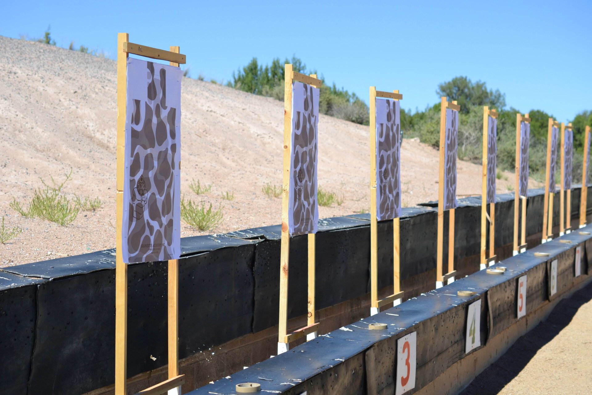 Carry-a-Gun-TX-paper-targets-at-a-gun-range-for-LTC-practice-Texas-scaled